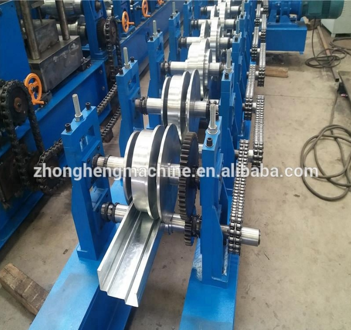 1.2mm Galvanized Steel Shutter Door Frame Roll Forming Machine with embossing design roll forming machine
